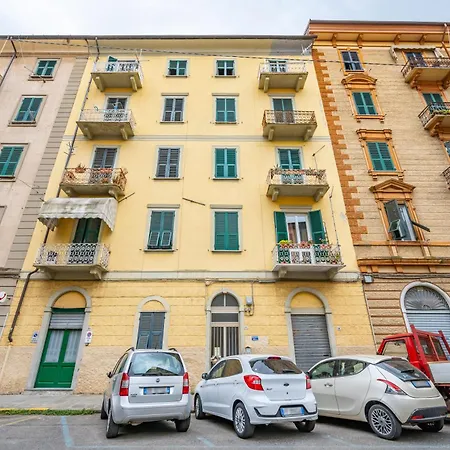 Yellow Near The Train Station With Balcony